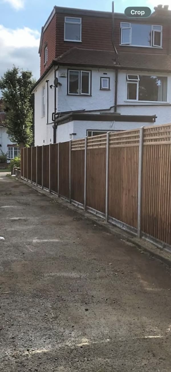 Timber close-board fence installation