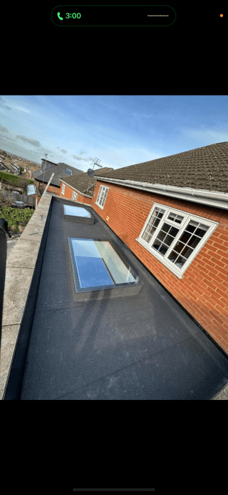 Flat roof installation with skylights