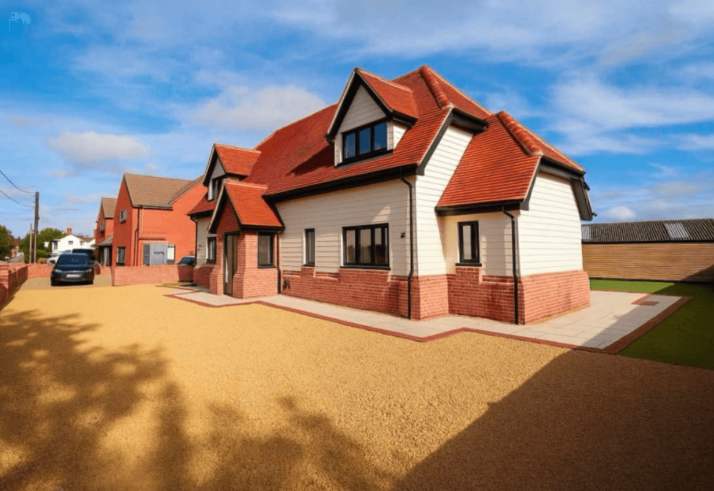 New build homes with tiled roofs and block paving driveway
