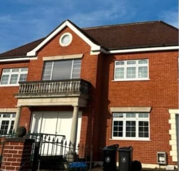 Brick detached house with new slate roof