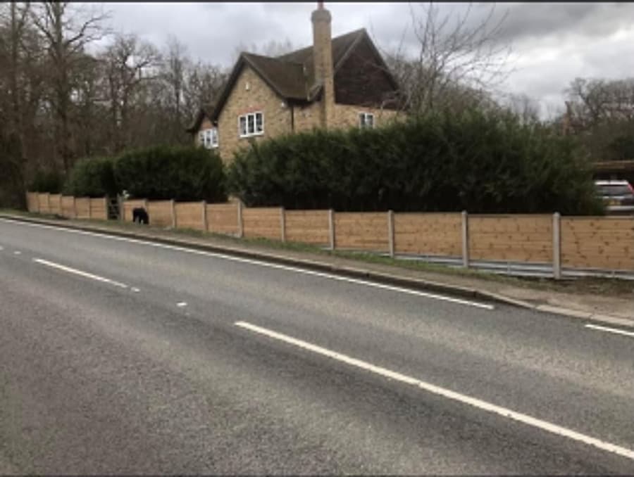 Roadside close-board fencing installation